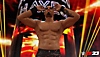 WWE 2K23 screenshot of wrestler flexing.