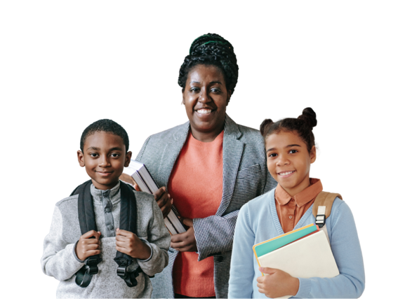 Black woman CS teacher alongside two of her elementary students, all smiling